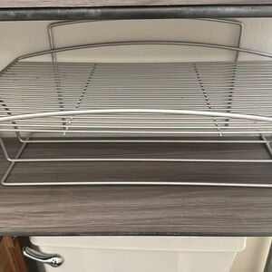 Towel or toilet paper holder for on top of toilet tank